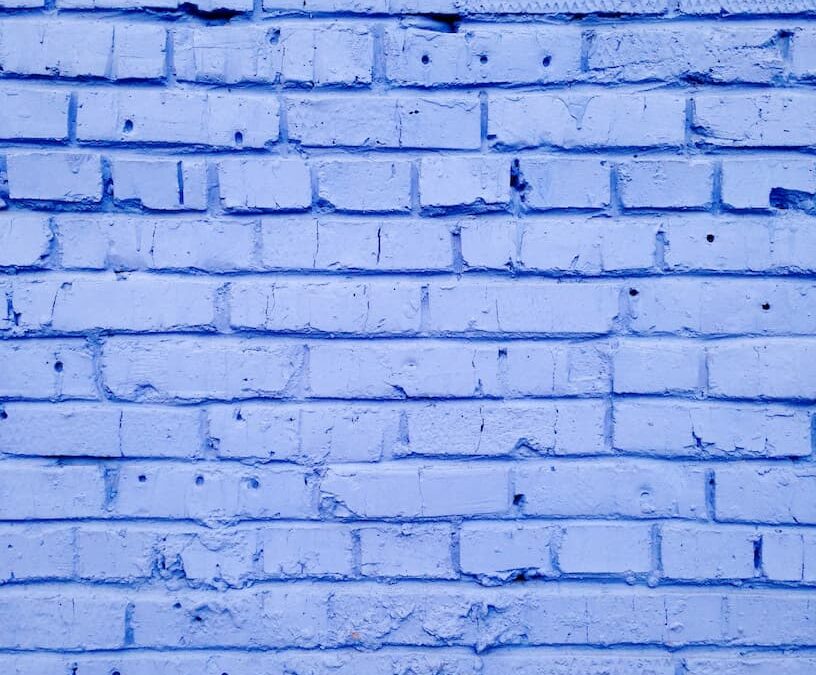 A brick wall painted blue
